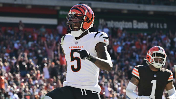 Oct 20, 2024; Cleveland, Ohio, USA; Cincinnati Bengals wide receiver Tee Higgins (5) scores a touchdown during the second half against the Cleveland Browns at Huntington Bank Field. Mandatory Credit: Ken Blaze-Imagn Images
