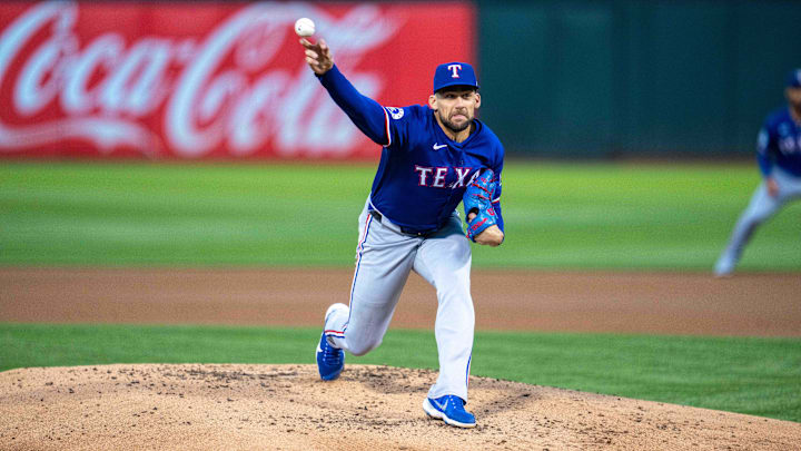 Sep 24, 2024; Oakland, California, USA; Texas Rangers starting pitcher Nathan Eovaldi (17) delivers a pitch against the Oakland Athletics during the first inning at Oakland-Alameda County Coliseum.
