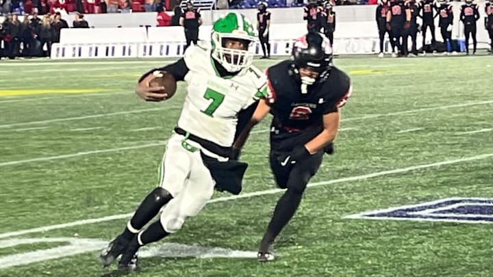 Arundel quarterback is chased by Linganore during Maryland Class 3A state championship game.