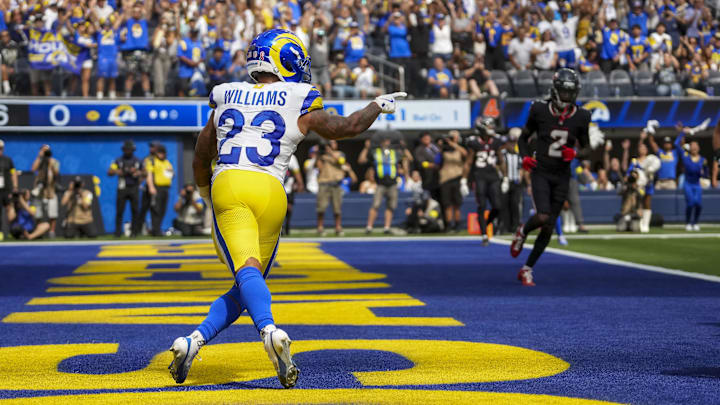 Sep 7, 2025; Inglewood, California, USA; Los Angeles Rams running back Kyren Williams (23) celebrates after scoring a touchtown during the second quarter at SoFi Stadium. Mandatory Credit: Kirby Lee-Imagn Images