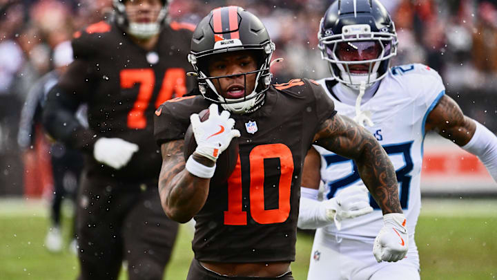 Dec 7, 2025; Cleveland, Ohio, USA; Cleveland Browns running back Quinshon Judkins (10) runs with the ball against Tennessee Titans safety Kevin Winston Jr. (23) during the first quarter at Huntington Bank Field. Mandatory Credit: Ken Blaze-Imagn Images Dec 7, 2025; Cleveland, Ohio, USA; Cleveland Browns running back Quinshon Judkins (10) runs with the ball against Tennessee Titans safety Kevin Winston Jr. (23) during the first quarter at Huntington Bank Field. Mandatory Credit: Ken Blaze-Imagn Images