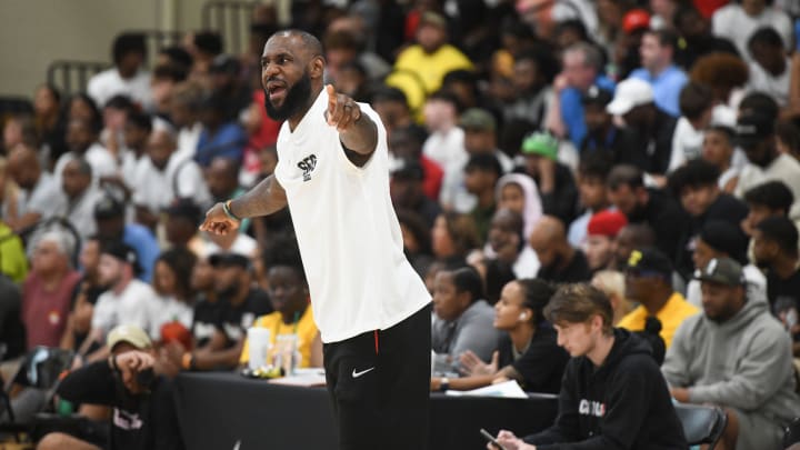 July 6, 2023; North Augusta, S.C., USA; NBA star LeBron James coaches from the bench during the Strive for Greatness and Mokan Elite basketball game at the fourth day of the Nike Peach Jam at Riverview Park Activities Center. Mandatory Credit: Katie Goodale-USA TODAY Network July 6, 2023; North Augusta, S.C., USA; NBA star LeBron James coaches from the bench during the Strive for Greatness and Mokan Elite basketball game at the fourth day of the Nike Peach Jam at Riverview Park Activities Center. Mandatory Credit: Katie Goodale-USA TODAY Network