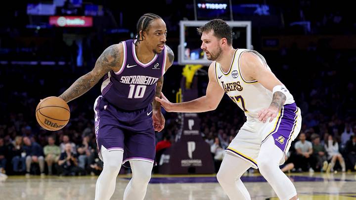Mar 1, 2026; Los Angeles, California, USA; Sacramento Kings guard DeMar DeRozan (10) dribbles the ball against Los Angeles Lakers guard Luka Doncic (77) during the second quarter at Crypto.com Arena. Mandatory Credit: William Navarro-Imagn Images Mar 1, 2026; Los Angeles, California, USA; Sacramento Kings guard DeMar DeRozan (10) dribbles the ball against Los Angeles Lakers guard Luka Doncic (77) during the second quarter at Crypto.com Arena. Mandatory Credit: William Navarro-Imagn Images