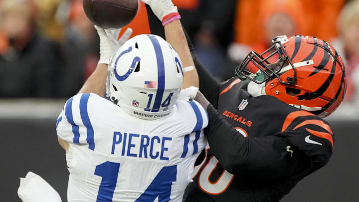 Dec 10, 2023; Cincinnati, Ohio, USA; Cincinnati Bengals cornerback DJ Ivey (38) breaks up a pass intended for Indianapolis Colts wide receiver Alec Pierce (14) at Paycor Stadium. Mandatory Credit: Bob Scheer-Imagn Images Dec 10, 2023; Cincinnati, Ohio, USA; Cincinnati Bengals cornerback DJ Ivey (38) breaks up a pass intended for Indianapolis Colts wide receiver Alec Pierce (14) at Paycor Stadium. Mandatory Credit: Bob Scheer-Imagn Images