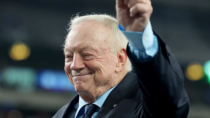 Dallas Cowboys owner Jerry Jones leaves the field before a game against the New York Giants.