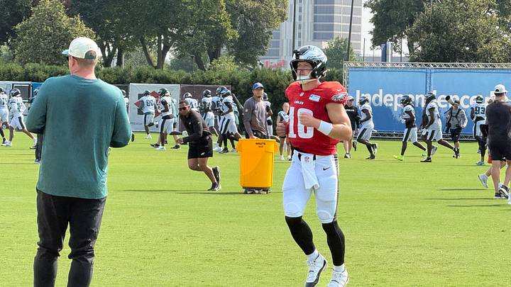 Eagles rookie quarterback Cole Payton goes through a drill during training camp. Eagles rookie quarterback Cole Payton goes through a drill during training camp.