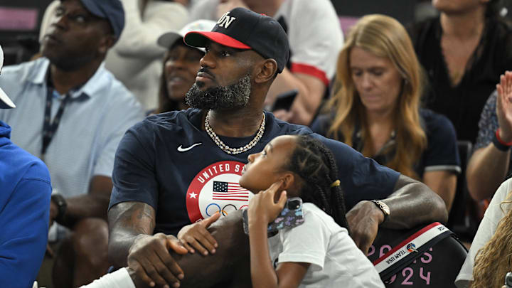 LeBron James with daughter Zhuri James at Team USA's women's gold medal game at the Olympics on Aug. 11, 2024.