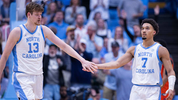 Mar 3, 2026; Chapel Hill, North Carolina, USA; North Carolina Tar Heels center Henri Veesaar (13) celebrates with guard Seth Trimble (7) during the second half against the Clemson Tigers at Dean E. Smith Center. Mandatory Credit: Scott Kinser-Imagn Images
