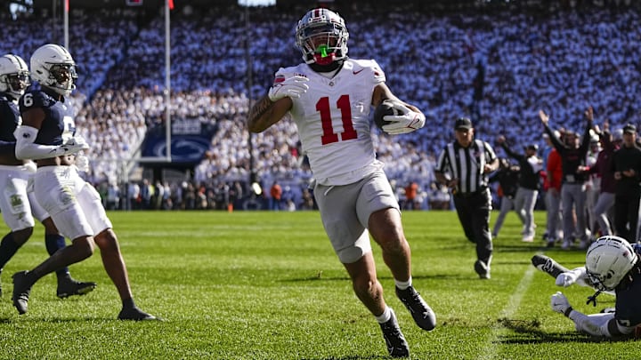 Ohio State Buckeyes wide receiver Brandon Inniss (11) makes a touchdown catch during the first half of the NCAA football game against the Penn State Nittany Lions.