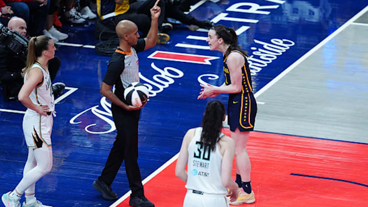 Caitlin Clark works on getting a technical foul during the Indiana Fever’s game against the New York Liberty.