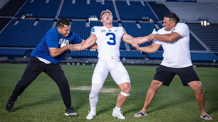 BYU commit McKay Madsen with BYU running backs coach Harvey Unga and BYU linebackers coach Justin Ena BYU commit McKay Madsen with BYU running backs coach Harvey Unga and BYU linebackers coach Justin Ena