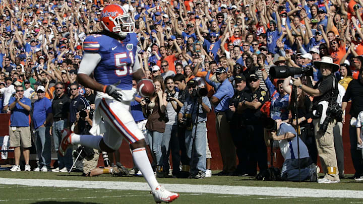 November 21, 2009; Gainesville, FL; Florida Gators linebacker Brandon Spikes (51) intercepts the ball and runs it back for a touchdown against FIU Golden Panthers at Ben Hill Griffin Stadium.