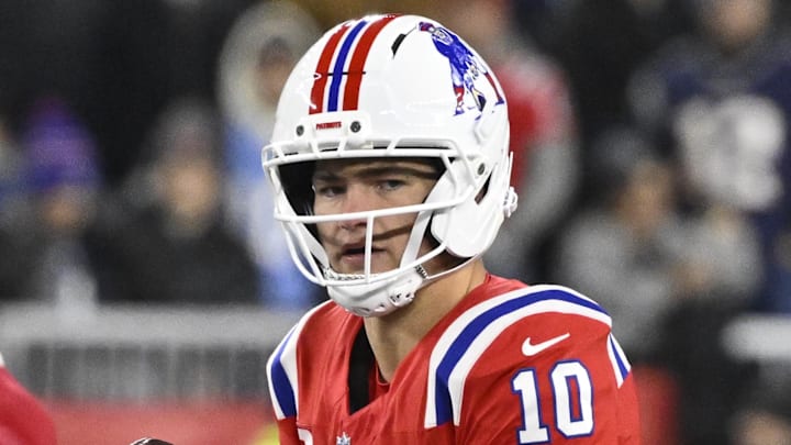 Dec 1, 2025; Foxborough, Massachusetts, USA; New England Patriots quarterback Drake Maye (10) catches the snap during the first quarter against the New York Giants at Gillette Stadium. Mandatory Credit: Eric Canha-Imagn Images