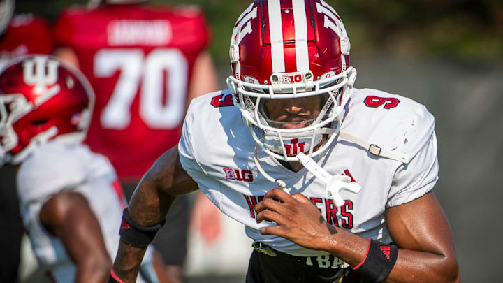 Indiana University's Jamier Johnson (9) runs during fall practice at the Mellencamp Pavilion at Indiana University on Tuesday, Aug. 6, 2024.