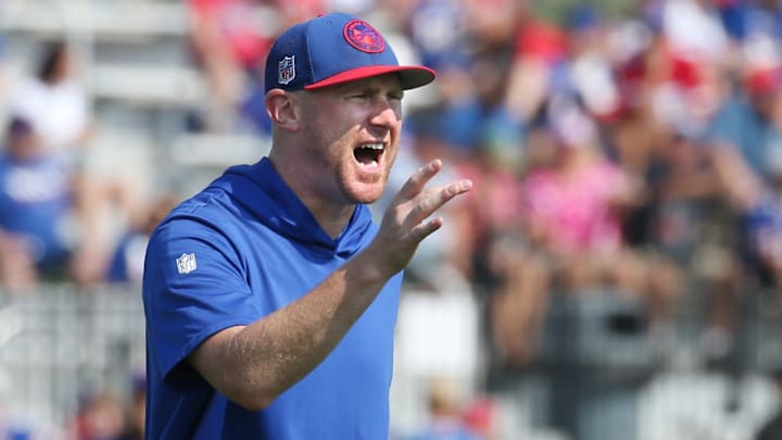 Bills offensive coordinator Joe Brady calls out during drills at St. John Fisher University in Pittsford Wednesday, July 24, 2024.