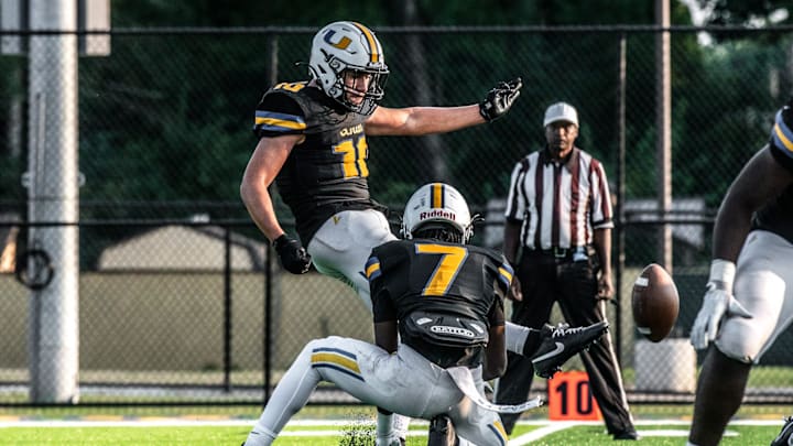 Redford Union's Kaemon Tijerina boots an extra point during a Western Wayne Athletic Conference football game on Friday, Sept. 13, 2024, at Bob Atkins Field.