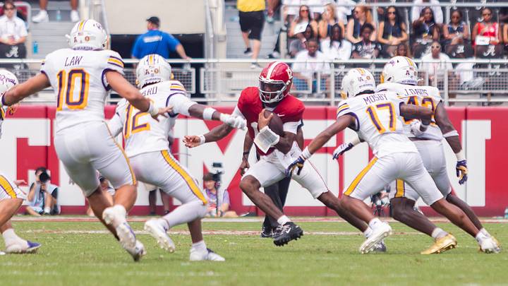 Alabama Quarterback Keelon Russell breaks tackles during the game against ECU on Sept 5, 2026. Alabama Quarterback Keelon Russell breaks tackles during the game against ECU on Sept 5, 2026.