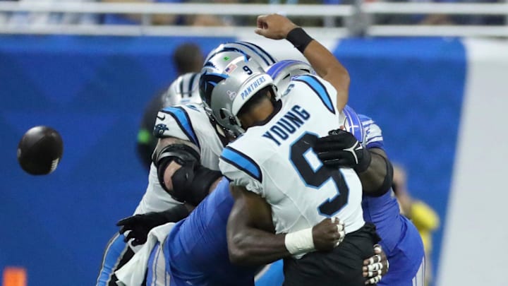 Former Detroit Lions defensive tackle Quinton Bohanna (90) pressures Carolina Panthers quarterback Bryce Young (9) Former Detroit Lions defensive tackle Quinton Bohanna (90) pressures Carolina Panthers quarterback Bryce Young (9)