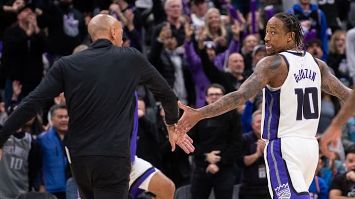 Jan 6, 2025; Sacramento, California, USA; Sacramento Kings head coach Doug Christie celebrates with forward DeMar DeRozan (10) in double overtime in the game against the Miami Heat at Golden 1 Center. Mandatory Credit: Ed Szczepanski-Imagn Images Jan 6, 2025; Sacramento, California, USA; Sacramento Kings head coach Doug Christie celebrates with forward DeMar DeRozan (10) in double overtime in the game against the Miami Heat at Golden 1 Center. Mandatory Credit: Ed Szczepanski-Imagn Images