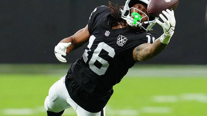Sep 29, 2024; Paradise, Nevada, USA; Las Vegas Raiders wide receiver Jakobi Meyers (16) attempts to make a catch against the Cleveland Browns during the third quarter at Allegiant Stadium. Mandatory Credit: Stephen R. Sylvanie-Imagn Images