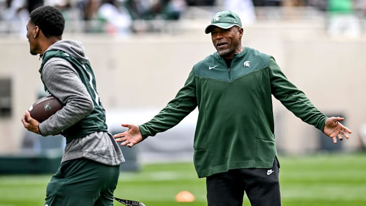 Michigan State's Michigan State's wide receivers coach Courtney Hawkins, right, talks with Jaden Mangham during the Spring Showcase on Saturday, April 20, 2024, at Spartan Stadium in East Lansing.