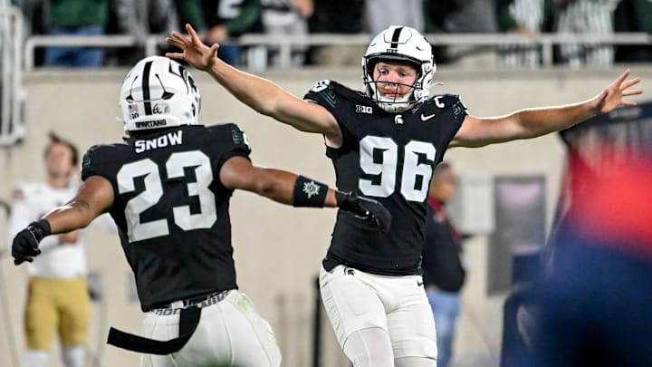 Michigan State's Ryan Eckley, right, celebrates a deep punt with teammate Darius Snow during the fourth quarter in the game against Boston College on Saturday, Sept. 6, 2025, at Spartan Stadium in East Lansing.