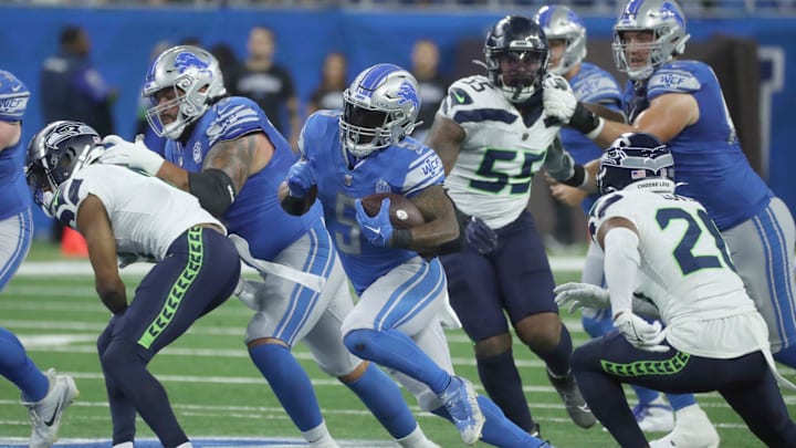 Detroit Lions running back David Montgomery (5) runs the ball against the Seattle Seahawks during first half action Sunday, Sept.17 2023. Detroit Lions running back David Montgomery (5) runs the ball against the Seattle Seahawks during first half action Sunday, Sept.17 2023.