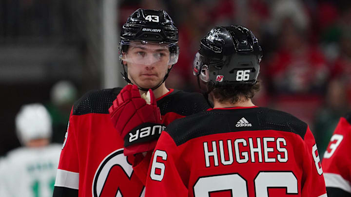 Feb 10, 2024; Raleigh, North Carolina, USA; New Jersey Devils center Jack Hughes (86) and defenseman Luke Hughes (43) talk against the Carolina Hurricanes during the first period at PNC Arena. Mandatory Credit: James Guillory-Imagn Images Feb 10, 2024; Raleigh, North Carolina, USA; New Jersey Devils center Jack Hughes (86) and defenseman Luke Hughes (43) talk against the Carolina Hurricanes during the first period at PNC Arena. Mandatory Credit: James Guillory-Imagn Images