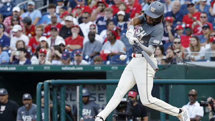 Sep 28, 2024; Washington, District of Columbia, USA; Washington Nationals outfielder James Wood (29) hits a two run home run against the Philadelphia Phillies during the sixth inning at Nationals Park. Sep 28, 2024; Washington, District of Columbia, USA; Washington Nationals outfielder James Wood (29) hits a two run home run against the Philadelphia Phillies during the sixth inning at Nationals Park.