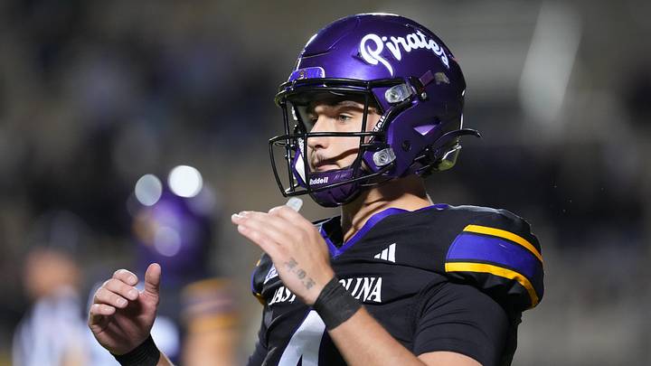 Oct 16, 2025; Greenville, North Carolina, USA; East Carolina Pirates quarterback Katin Houser (4) react against the Tulsa Golden Hurricane during the first half at Dowdy-Ficklen Stadium. Mandatory Credit: James Guillory-Imagn Images Oct 16, 2025; Greenville, North Carolina, USA; East Carolina Pirates quarterback Katin Houser (4) react against the Tulsa Golden Hurricane during the first half at Dowdy-Ficklen Stadium. Mandatory Credit: James Guillory-Imagn Images