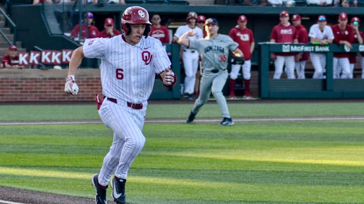 Oklahoma infielder Kyle Branch runs to first base against Gonzaga.