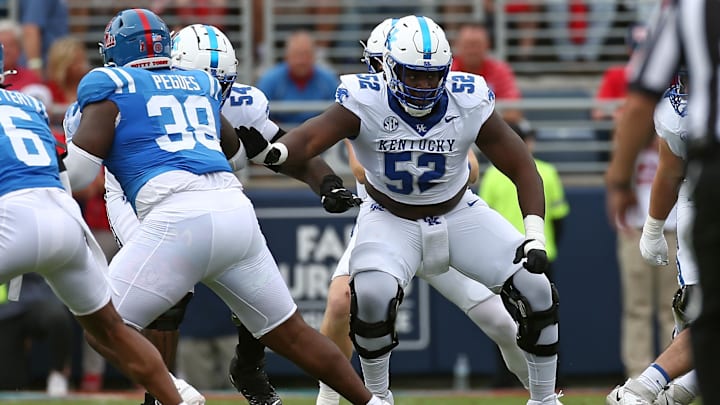 Sep 28, 2024; Oxford, Mississippi, USA; Kentucky Wildcats offensive lineman Jalen Farmer (52) blocks during the first half against the Mississippi Rebels at Vaught-Hemingway Stadium. Mandatory Credit: Petre Thomas-Imagn Images