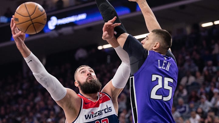 Jan 19, 2025; Sacramento, California, USA; Washington Wizards center Jonas Valanciunas (17) puts up a shot over Sacramento Kings center Alex Len (25) during the second quarter at Golden 1 Center. Mandatory Credit: Ed Szczepanski-Imagn Images