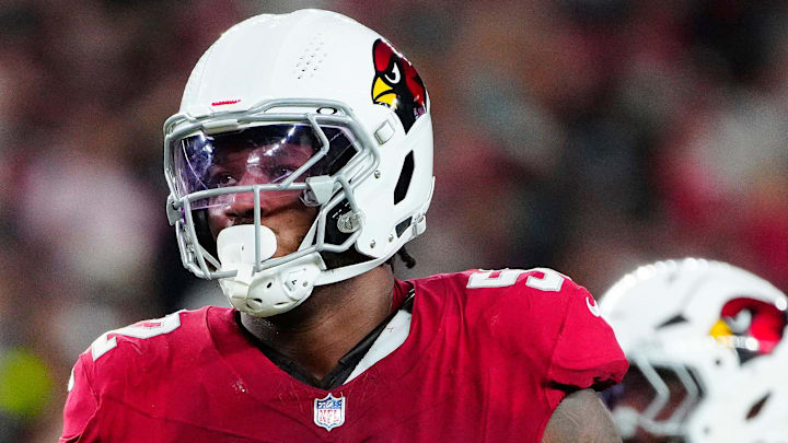 Cardinals edge rusher Jordan Burch (52) lines up against the Raiders during a preseason game at State Farm Stadium in Glendale on Aug. 23, 2025. Cardinals edge rusher Jordan Burch (52) lines up against the Raiders during a preseason game at State Farm Stadium in Glendale on Aug. 23, 2025.
