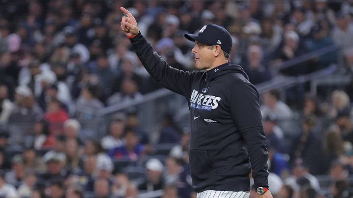 Oct 7, 2026; Bronx, New York, USA; New York Yankees manager Aaron Boone calls for a new pitcher during the eighth inning against the Tampa Bay Rays in Game 3 of the ALDS for the 2026 MLB playoffs at Yankee Stadium. Mandatory Credit: Brad Penner-Imagn Images