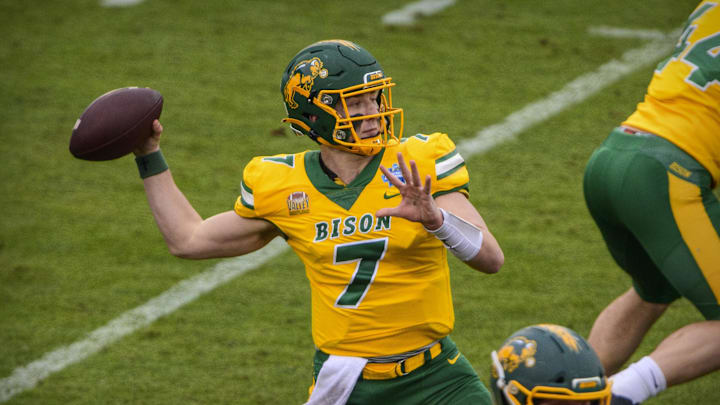 Jan 8, 2022; Frisco, TX, USA; North Dakota State Bison quarterback Cam Miller (7) passes against the Montana State Bobcats during the first half of the FCS Championship at Toyota Stadium. Mandatory Credit: Jerome Miron-Imagn Images