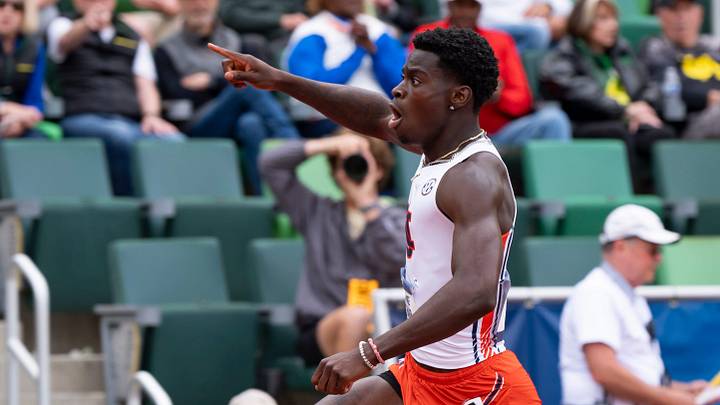 Auburn’s Ja'Kobe Tharp wins the men’s 110-meter hurdles in the NCAA Outdoor Championships on Friday.