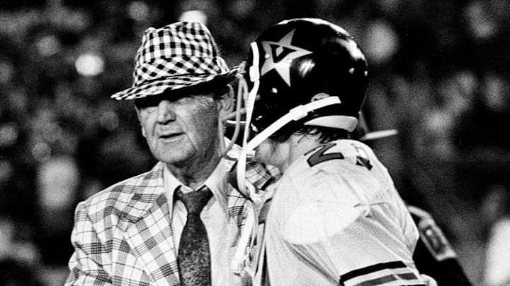 Alabama coach Bear Bryant, left, shakes the hand of Vanderbilt defensive back Steve Curnutte (21) at the end of the game on Sept. 29, 1973. The fifth-ranked Crimson Tide defeated Vanderbilt 44-0 before 34,000 fans at Dudley Field.