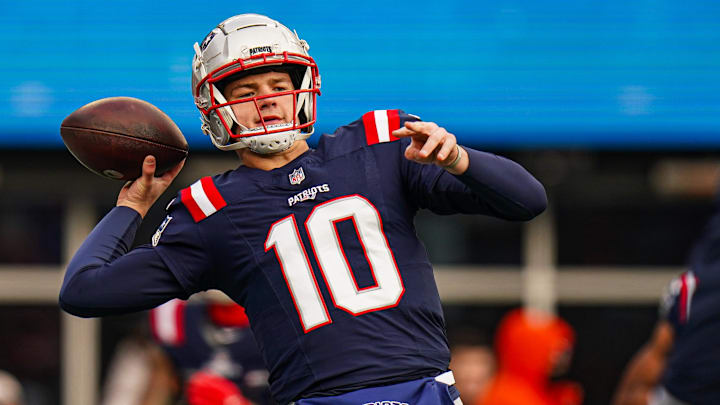 Jan 5, 2025; Foxborough, Massachusetts, USA; New England Patriots quarterback Drake Maye (10) warms up before the start of the game against the Buffalo Bills at Gillette Stadium. Mandatory Credit: David Butler II-Imagn Images