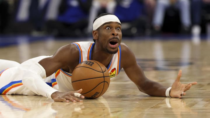 Mar 17, 2026; Orlando, Florida, USA; Oklahoma City Thunder guard Shai Gilgeous-Alexander (2) reacts after a loose ball against the Orlando Magic in the second quarter at Kia Center. Mandatory Credit: Nathan Ray Seebeck-Imagn Images