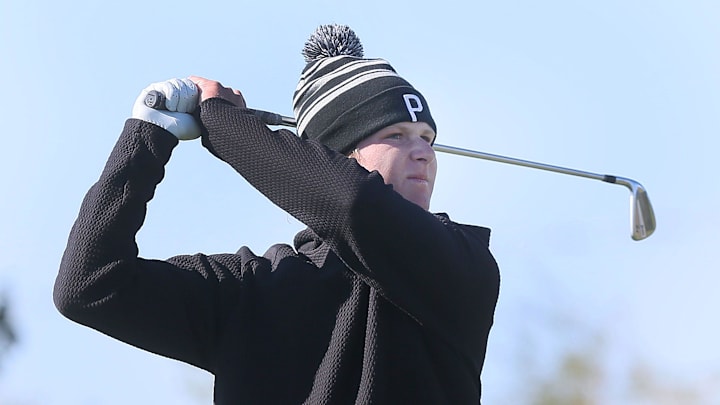Johnston’s Andrew Johannsen looks at the ball after a tee onto the 10th hole in the class 4A IHSAA state golf championship final round at Briawood Golf Course on Tuesday, Oct. 15, 2024, in Ankeny, Iowa.