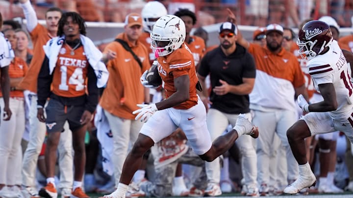 Sep 28, 2024; Austin, Texas, USA;  Texas Longhorns wide receiver Johntay Cook II (1) runs the ball in the second half against the Mississippi State Bulldogs at Darrell K Royal-Texas Memorial Stadium. Mandatory Credit: Daniel Dunn-Imagn Images