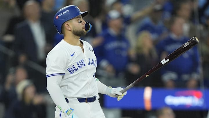 Bo Bichette of Toronto Blue Jays hits ball with bat