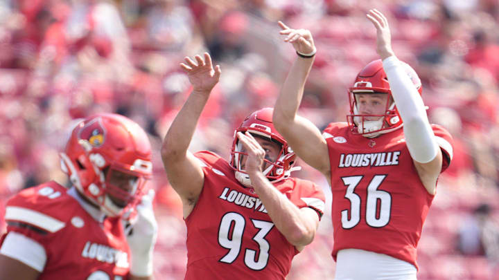 Louisville Cardinals place kicker Cooper Ranvier (36) and Louisville Cardinals place kicker David Chapeau (93) mimics making a basketball shot after Ranvier's field goal was good as the Cards (3-0) cruised past Bowling Green 40-17 in football Saturday, Sept. 20, 2025, in Louisville, Kentucky Louisville Cardinals place kicker Cooper Ranvier (36) and Louisville Cardinals place kicker David Chapeau (93) mimics making a basketball shot after Ranvier's field goal was good as the Cards (3-0) cruised past Bowling Green 40-17 in football Saturday, Sept. 20, 2025, in Louisville, Kentucky