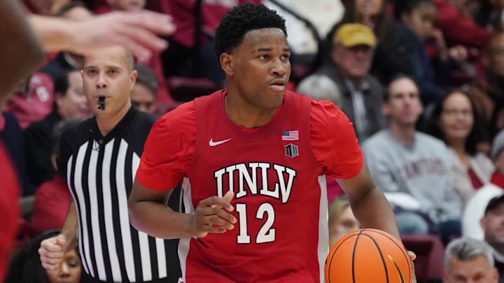 UNLV Runnin' Rebels guard Issac Williamson (12) dribbles upcourt against the Stanford Cardinal in the second half at Maples Pavilion. Mandatory Credit: David Gonzales-Imagn Images