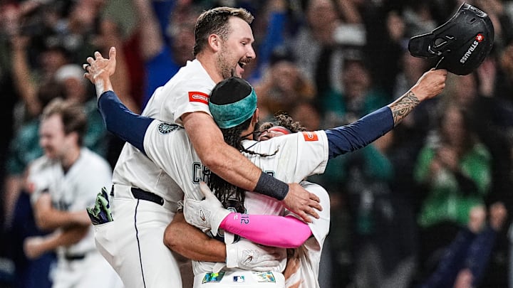 Cal Raleigh (left) was the star of the Mariners’ ALDS win over Detroit.