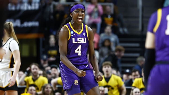 Apr 1, 2024; Albany, NY, USA; LSU Lady Tigers guard Flau'jae Johnson (4) reacts in the second quarter against the Iowa Hawkeyes in the finals of the Albany Regional in the 2024 NCAA Tournament at MVP Arena. Mandatory Credit: Winslow Townson-Imagn Images