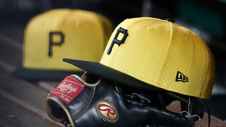 Sep 16, 2023; Pittsburgh, Pennsylvania, USA; Pittsburgh Pirates hats and gloves in the dugout against the New York Yankees during the sixth inning at PNC Park. Mandatory Credit: Charles LeClaire-USA TODAY Sports Sep 16, 2023; Pittsburgh, Pennsylvania, USA; Pittsburgh Pirates hats and gloves in the dugout against the New York Yankees during the sixth inning at PNC Park. Mandatory Credit: Charles LeClaire-USA TODAY Sports