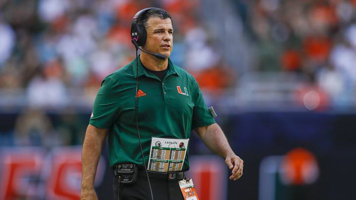 Sep 3, 2022; Miami Gardens, Florida, USA; Miami Hurricanes head coach Mario Cristobal watches from the sideline during the second quarter against the Bethune Cookman Wildcats at Hard Rock Stadium. Mandatory Credit: Sam Navarro-Imagn Images