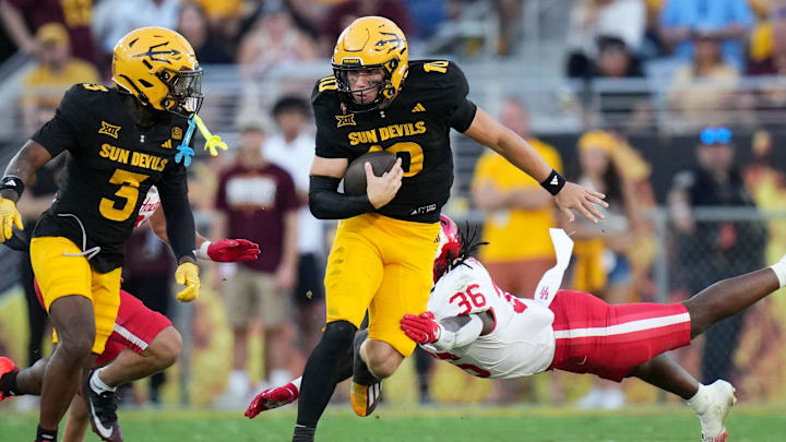 ASU Sun Devils quarterback Sam Leavitt (10) scrambles out of the backfield against the Houston Cougars at Mountain America Stadium in Tempe on Oct. 25, 2025.